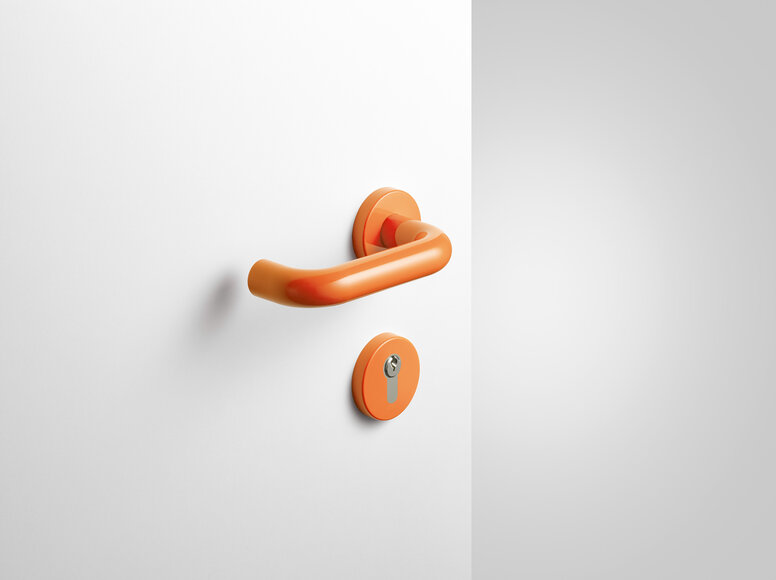 Béquille de porte avec rosace à clé de couleur orange en polyamide