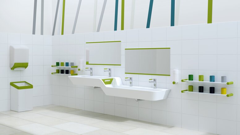 Child-friendly washbasin with green accents, washbasin with built-in height and depth graduation next to colorful toothbrush cup rails