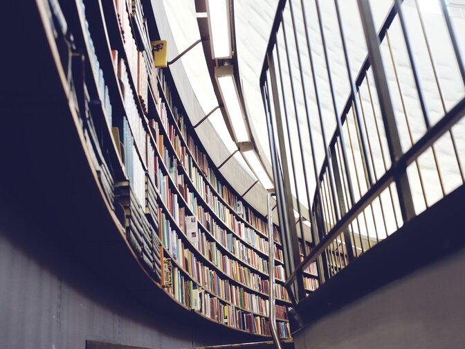 Library with a rounded wall full of books